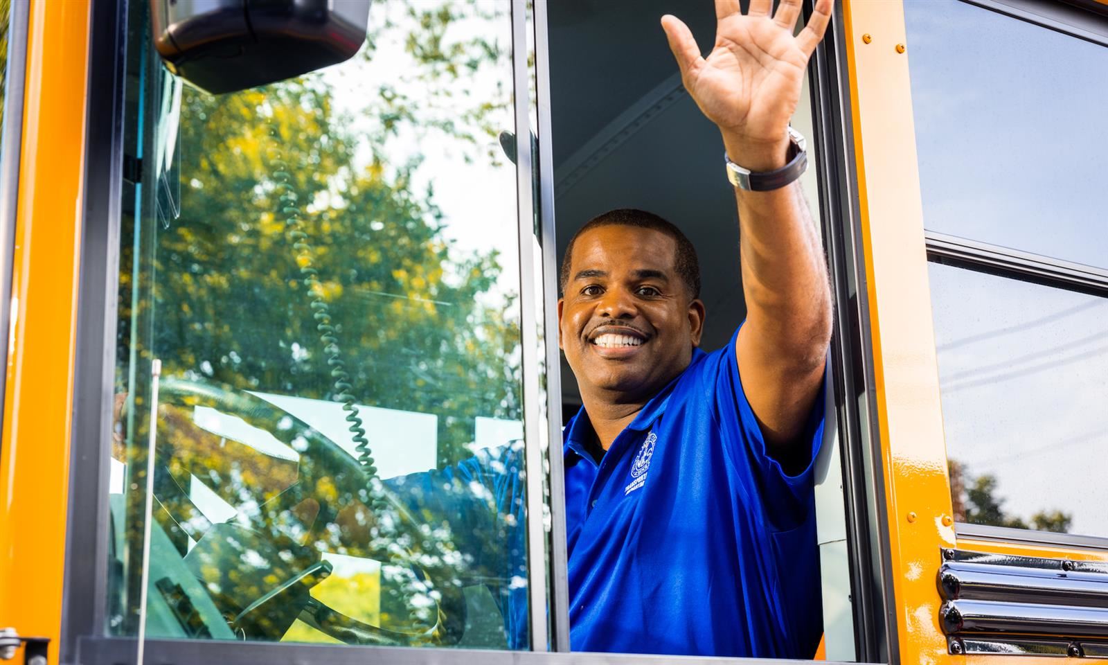 Bus driver waves